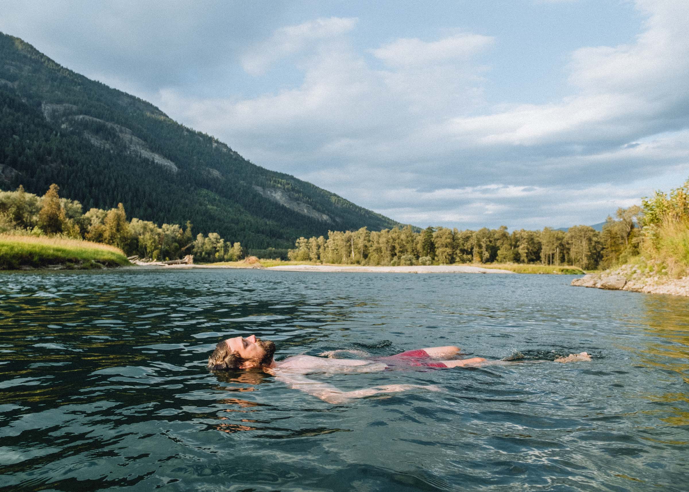 Summer swims in the pastoral in the Slocan River