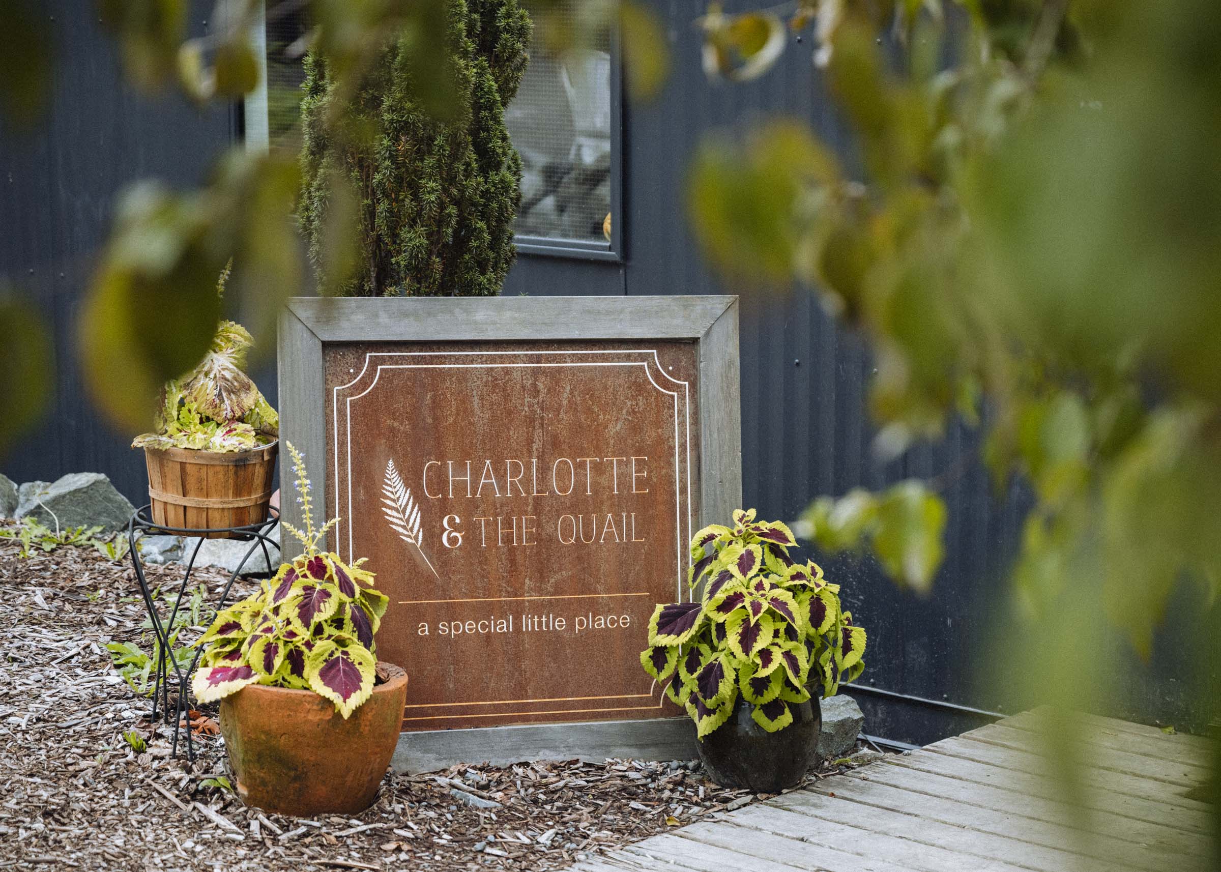 The entrance to Charlotte & the Quail, a cozy little restaurant cafe north of Victoria, BC