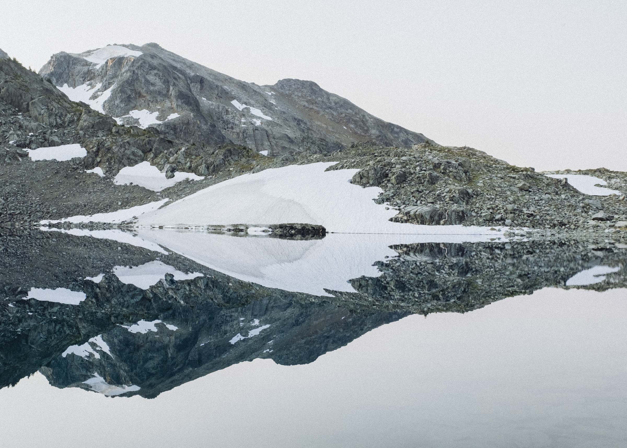 Mountain reflections and snowy mirrors